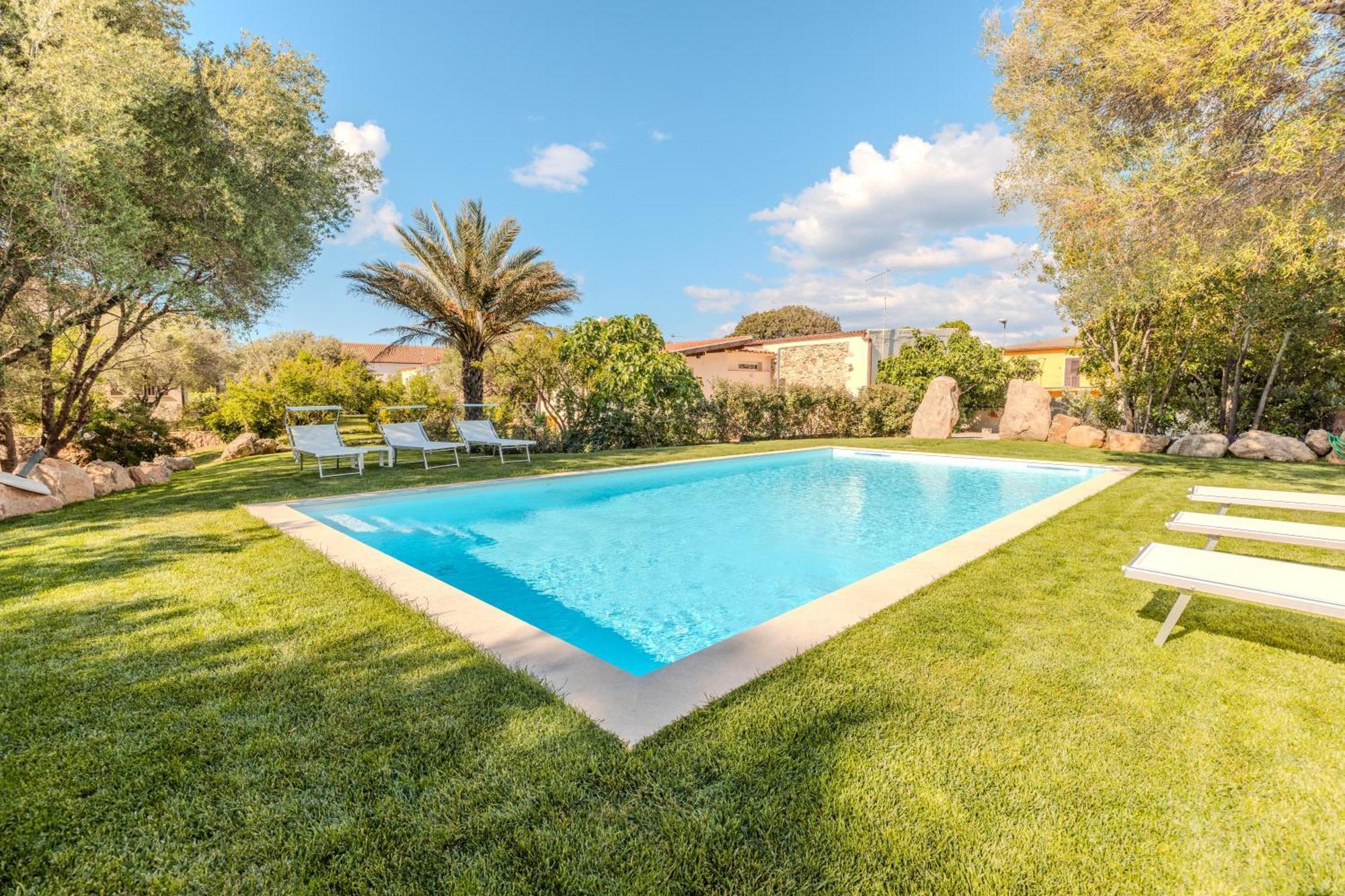 شقة Stazzo San Teodoro La Quercia Piscina Condivisa المظهر الخارجي الصورة